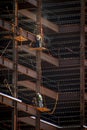 Ironworkers with safety lines working on the outside of steel framing Royalty Free Stock Photo