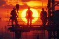 Ironworkers silhouette against a setting sun, wide shot emphasizing industrial might Royalty Free Stock Photo