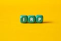 Irp - Integrated Resource Plan, word concept on building blocks, text