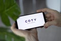 IRPEN, UKRAINE - JANUARY 20 20223, Closeup of smartphone screen Coty logo lettering with in man's hands