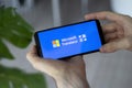 IRPEN, UKRAINE - JANUARY 20 20223, Closeup of smartphone screen Microsoft Translator logo lettering with in man's