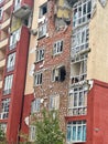 Irpen, Ukraine. May 07. 2022. Fragment of the facade of a residential building with walls destroyed by the shelling of