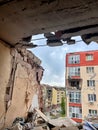 Irpen, Ukraine. May 07. 2022. View from the ruined apartment through a hole in the wall from a Russian shell