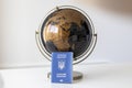 IRPEN, UKRAINE, SEPTEMBER 23 20222, Ukrainian passport against the background of a stylish black gold globe