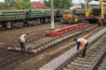 Repair workers modernize the Irpin-Bucha railway line on Kiev region.