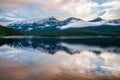 Mountains in play illuminated by sunset in Norway in a fjord. Royalty Free Stock Photo
