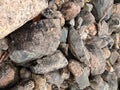 irregular pile of stones and closeup pebbels Royalty Free Stock Photo