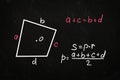 Irregular quadrilateral perimeter and area formulas written on chalkboard