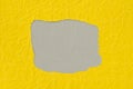 Irregular shape hole on piece on yellow paper