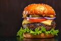 Irresistible homemade burger displayed beautifully against dark backdrop banner Royalty Free Stock Photo