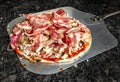 Gourmet Pizza Ready for Oven - Savory Delights Await Royalty Free Stock Photo