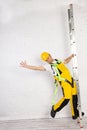 Irresponsible use of a ladder during construction work. Royalty Free Stock Photo