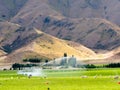 Irrigating lush farm pastures in central Otago, NZ Royalty Free Stock Photo