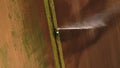 Aerial view:Irrigation system watering a farm field. Royalty Free Stock Photo