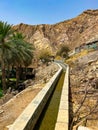 Irrigation system aflaj in a ruined village Birkat Al Mouz, Oman