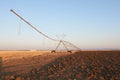 Irrigation system in field at sunset in field. Toledo, Spain