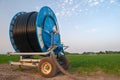 Irrigation system watering agricultural field of carrots and parsley