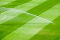 Irrigation turf working on the fresh green grass on the football field Royalty Free Stock Photo