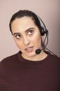 Irritated young call center operator