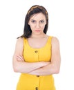 Irritated young woman holding her arms crossed, having skeptic, angry and annoyed face, isolated on white background