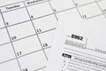 IRS Form 8962 Premium tax cerdit PTC blank lies on empty calendar page