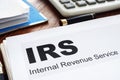 IRS Internal Revenue Service documents and folder