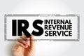 IRS Internal Revenue Service - responsible for collecting taxes and administering the Internal Revenue Code, acronym text stamp Royalty Free Stock Photo