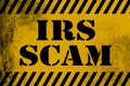 IRS scam sign yellow with stripes Royalty Free Stock Photo