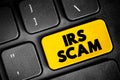 IRS Scam text button on keyboard, concept background Royalty Free Stock Photo