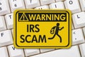 IRS scam warning sign with keyboard Royalty Free Stock Photo