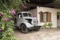 Irurtia vineyards: old Bedford truck, construction and flowered bougainvillea