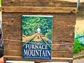 Irvine, Ky US - April 29, 2017 Mountain Mushroom Festival A book sits on a display on a handmade wooden shelf in a vendor`s booth