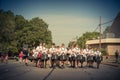 Team of high school drummers on street at Independence Day celebration Royalty Free Stock Photo