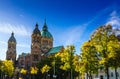 Isar and autumn landscape nerxt to Sankt Lukas church in Munich, Bavaria, Germany Royalty Free Stock Photo