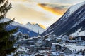 Sunset in mountains. Winter evening in ski resort Ischgl in Tyrol Alps