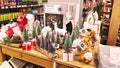 ISERLOHN, GERMANY DECEMBER 06 2025: assorted christmas decorations including small trees and reindeer on display in woolworth Royalty Free Stock Photo