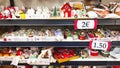ISERLOHN, GERMANY DECEMBER 06 2025: inexpensive christmas decorations displayed on shelf in woolworth store today Royalty Free Stock Photo