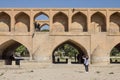 ISFAHAN, IRAN - AUGUST 20, 2016: People taking selfies on and next to Si o Seh Pol bridge in Iran