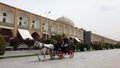 Isfahan, Iran - 2019-04-12 - Horse Carriage Ride Around Naqshe Cehan Square 1 - Rider Uses For Phone For Video