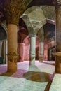 Arches and columns inside Jameh mosque at night in Isfahan. Iran Royalty Free Stock Photo