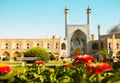 Isfahan, Iran - 15th may, 2022: Entrance into the Friday Mosque (Jame Mosque Of Isfahan) with garden foreground