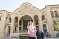 Isfahan Province- Kashan IRAN-April 30- 2019 Beautiful woman taking selfie in front of historical Borujerdi house building Royalty Free Stock Photo