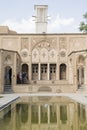 Isfahan Province- Kashan  IRAN-April 30- 2019 Traditional persian courtyard- people visiting the Borujerdi house-Vertical Royalty Free Stock Photo