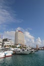 Sky, waterway, marina, water, transportation, sea, harbor, daytime, city, tower, block, boat, condominium, cloud, skyline, port, m