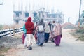 ISKCON Mayapur, West Bengal, India - Dec 15, 2019. international group of pilgrims in national Indian Vaishnava clothes