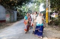 ISKCON Mayapur, West Bengal, India - Dec 15, 2019. international group of pilgrims in national Vaishnava clothes saris