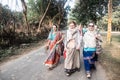 ISKCON Mayapur, West Bengal, India - Dec 15, 2019. international group of pilgrims in national Vaishnava clothes saris