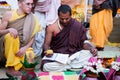 ISKCON Mayapur, West Bengal, India - Feb 15, 2020. young Hindu brahmana Vaishnav conducts ritual ceremony. Yagya fire flame ritual