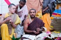 ISKCON Mayapur, West Bengal, India - Feb 15, 2020. young Hindu brahmana Vaishnav conducts ritual ceremony. Yagya fire flame ritual Royalty Free Stock Photo