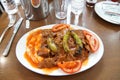 Iskender kababs in tomato sauce Royalty Free Stock Photo